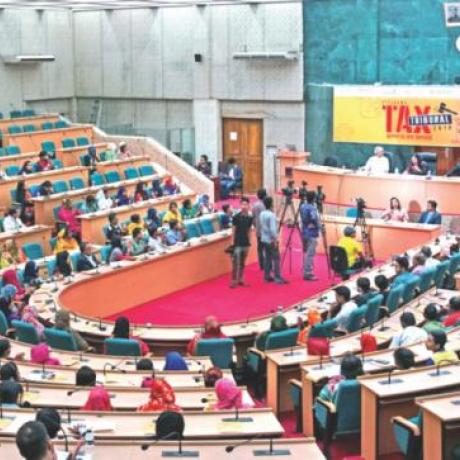 Participants are seen at “Citizen's Tax Tribunal”, a mock tribunal, organised by ActionAid Bangladesh at Nabab Nawab Ali Chowdhury Senate Bhaban of the University of Dhaka.